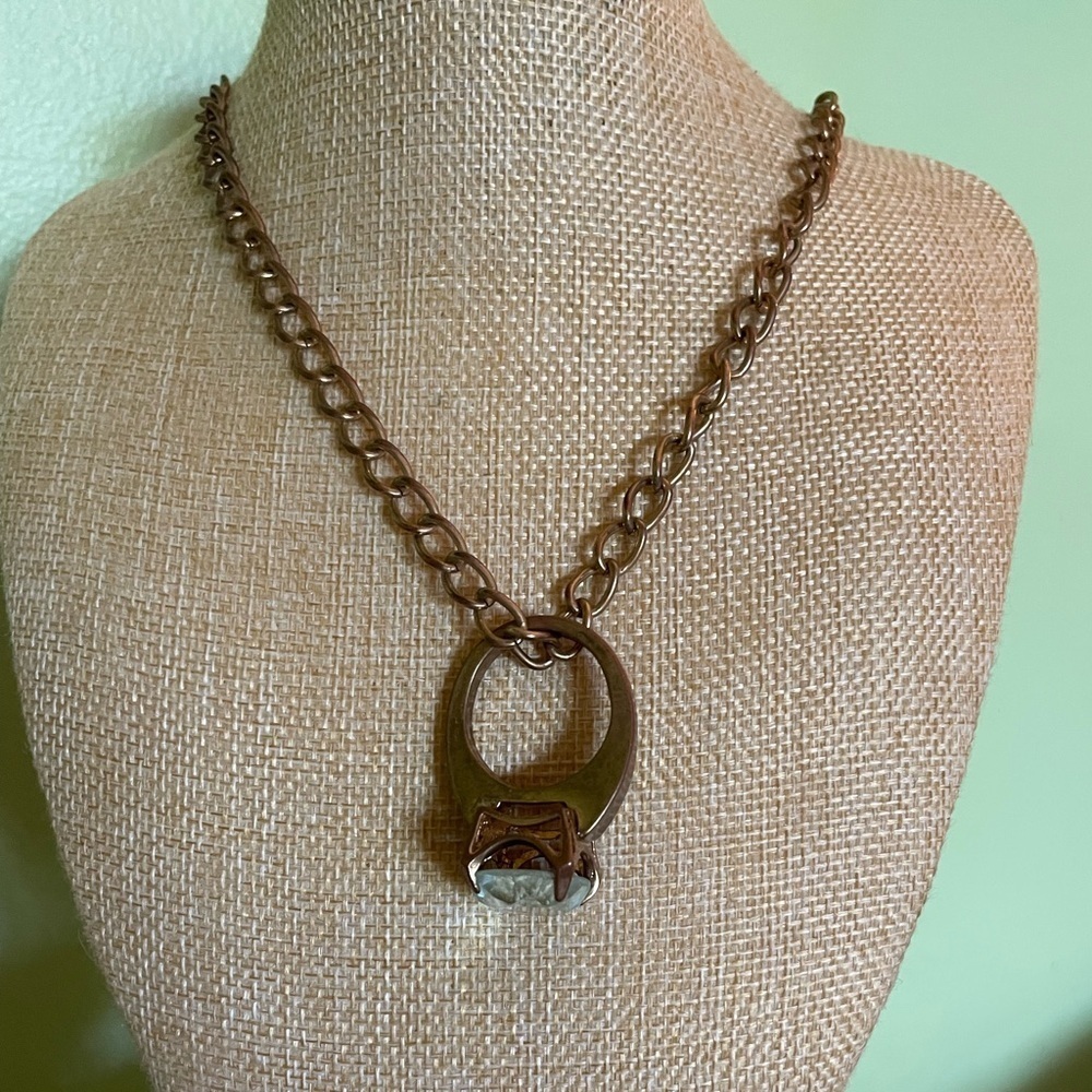 Elegant Brown Chain Necklace with large white stone ring pendant